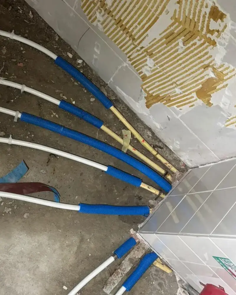 Newly installed water pipes in the floor